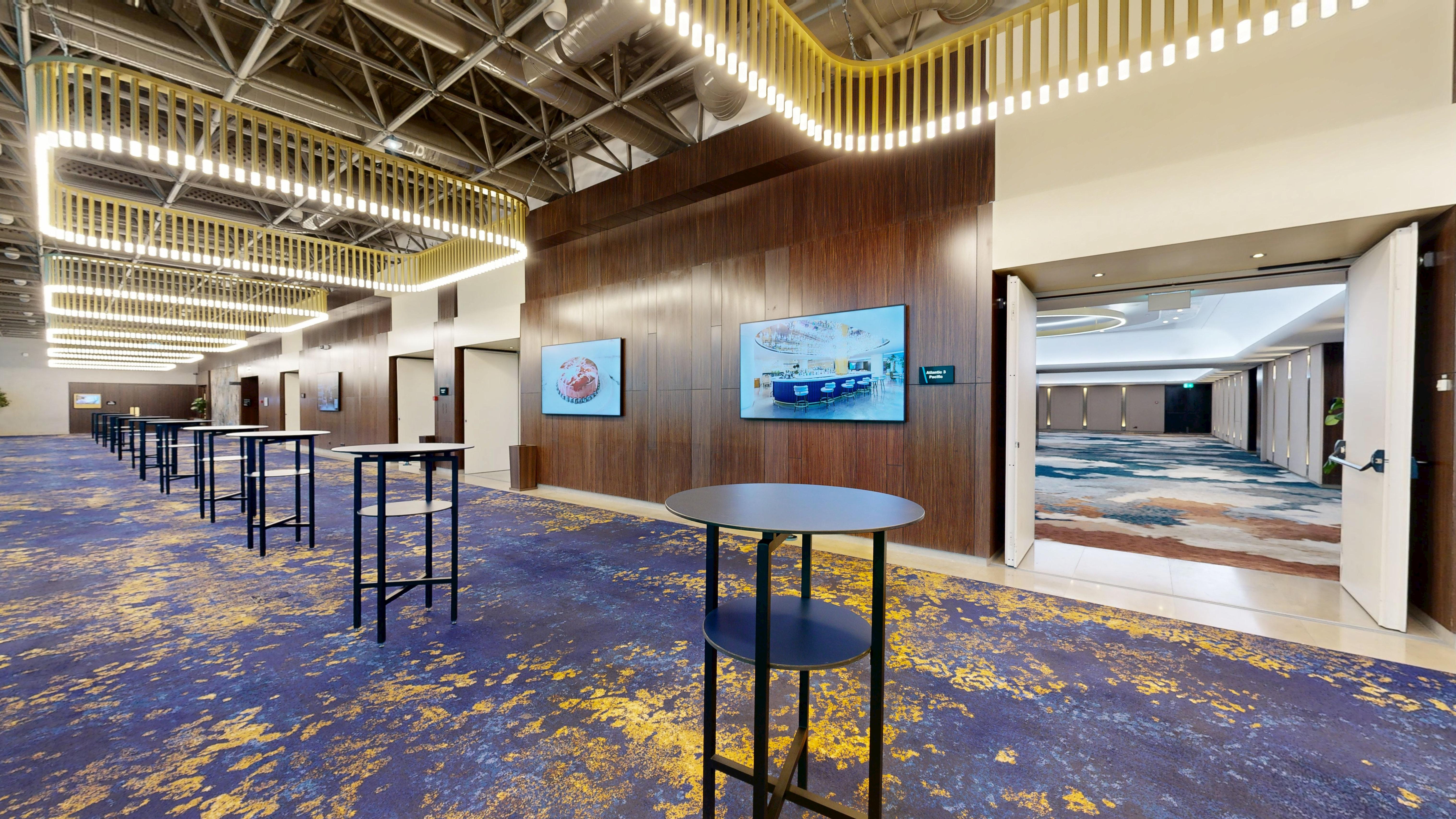 Atlantic Pacific Hall — Foyer with cocktail tables